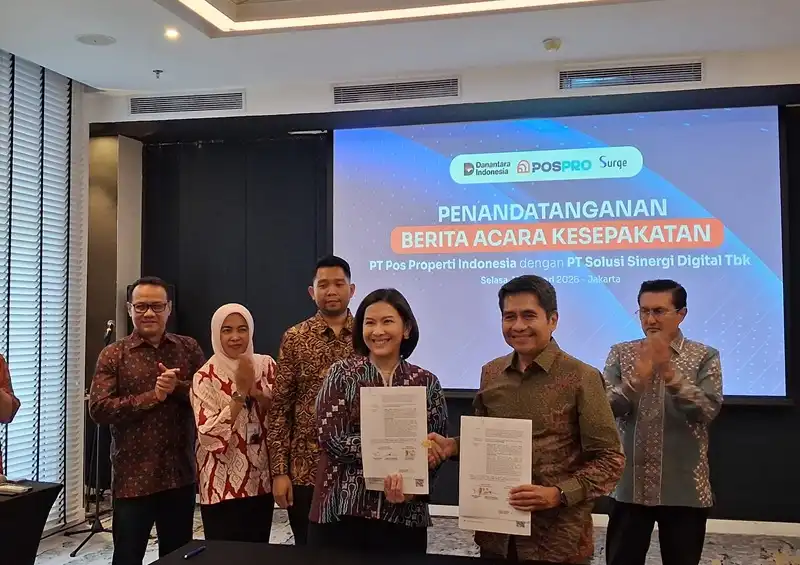 Jajaran direksi PT Pos Properti Indonesia dan PT Solusi Sinergi Digital Tbk (SURGE) menjalin kerja sama. Foto: Doc. WIFI