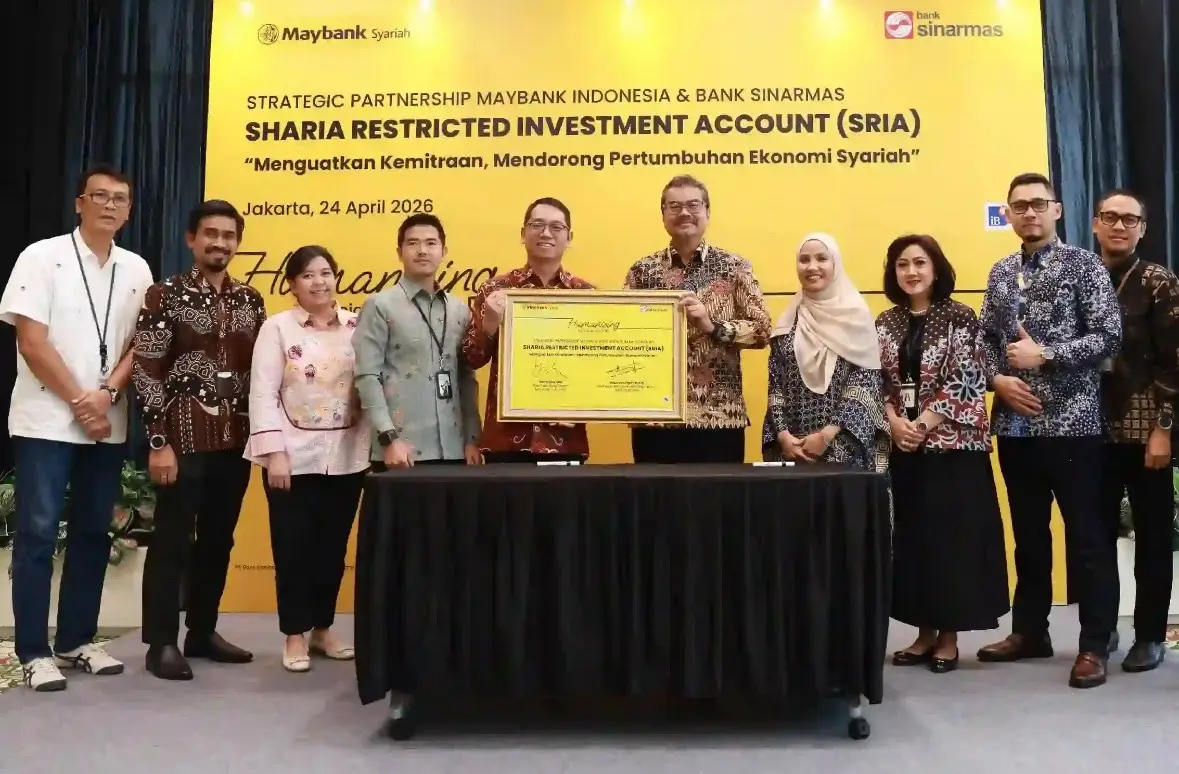 Maybank Indonesia gandeng Bank Sinarmas, bentuk kerja sama transaksi Sharia Restricted Investment Account (SRIA). Foto: dok. Maybank Indonesia